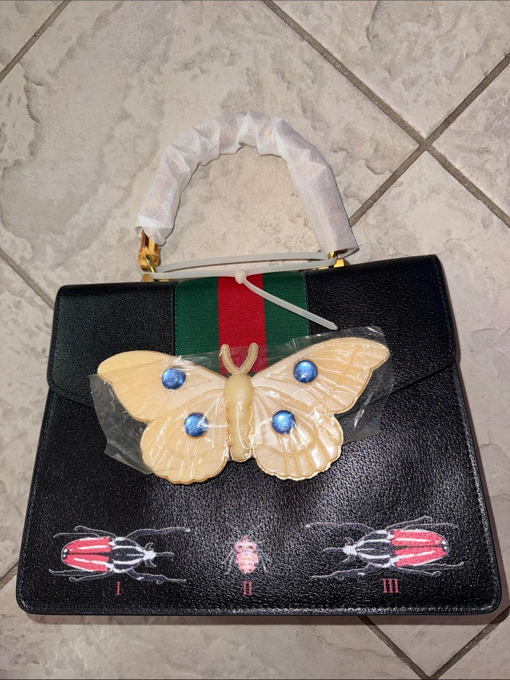 Black Leather Satchel with Green and Red Stripe and Cream Butterfly Accent